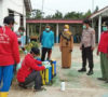 Antisipasi Virus Corona Masuk Desa, Kades dan Bidan Turun ke Jalan