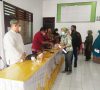 Pemkab Asahan Salurkan Buku Tabungan Dana Pinjaman Bergulir
