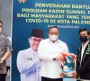 Ketua Umum Kadin Sumsel Bersama Mahasiswa Beri Bantuan warga Terdampak Covid-19